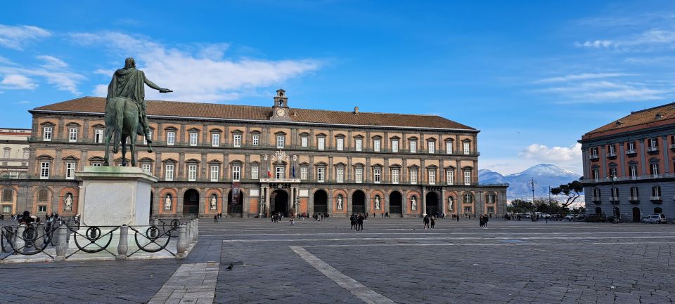 Bourbon Naples: Exclusive guide and Royal Palace pass - Piazza Municipio to Castel Nuovo: medieval power within city walls