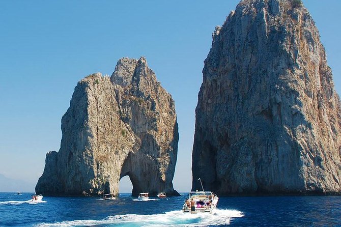 Capri Deluxe: First to Blue Grotto/Boat Ride Options from Naples - 2-hour wooden boat tour: the island from Tiberius’ Jump to Faraglioni