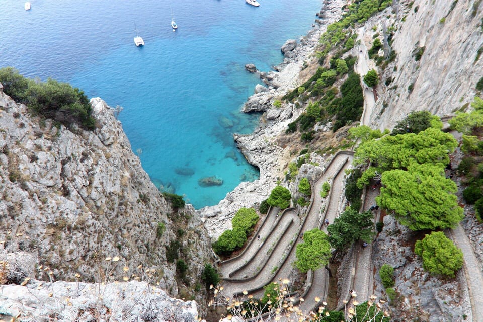 From Naples: Blue Grotto, Capri, and Anacapri Group Tour - Capri town: Piazzetta, shopping streets, and a quick reality check
