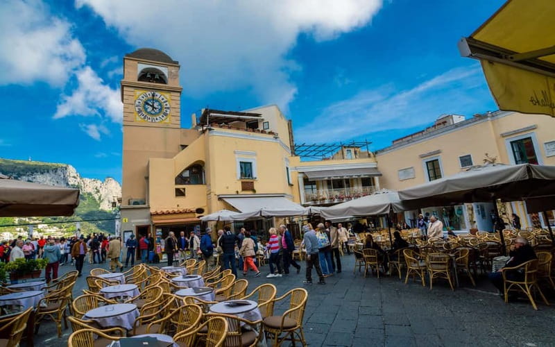 From Naples: Complete Capri Guided Boat and Bus Tour - Marina Grande and the 1-hour gozzo boat cruise