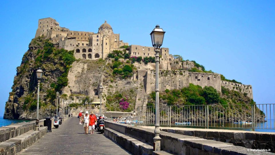 From Naples: Ischia Day Trip with Ferry Tickets and Lunch - Aragonese Castle: The Fortress Area With a Bridge the Sea Keeps Testing
