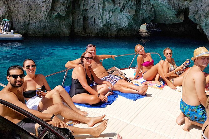 Full day Capri Island Small Group Boat Tour from Naples - Capri’s poster child: Faraglioni and Punta Carena Lighthouse