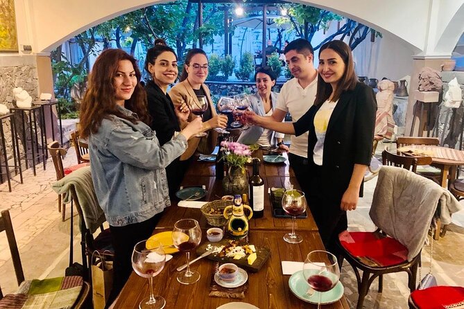 Guided, FUN Wine Tasting with Trivia Games, Napoli - Price and value: $54.07 for two wines, snacks, and a guided “edutainment” format