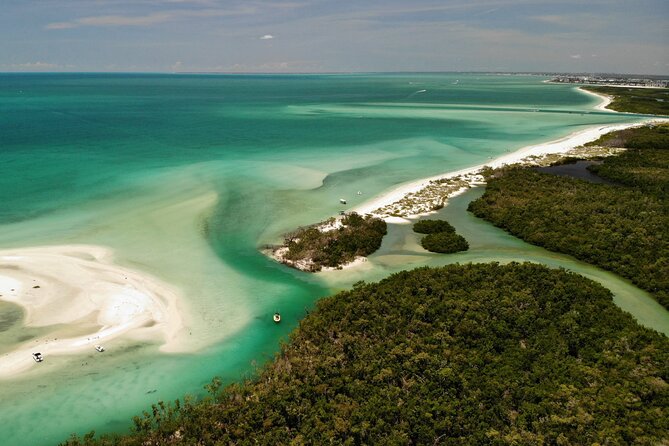 Kayak and SUP Rentals - Big Hickory Island - Fort Myers Beach, FL - The West-Side Beach with No Road Access (and Why Shells Are the Main Event)