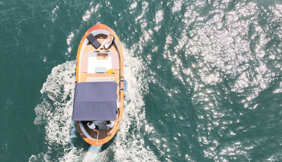 Naples: Castel dell'Ovo Boat Tour with Snorkeling & Aperitif - Onboard aperitif: seafood, calm time, and a break from the city rush