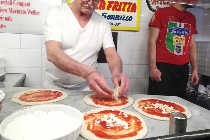 Naples Street Food Tour with Foodie Guide around Historical Center - Spaccanapoli: Limoncello on the street that splits the city