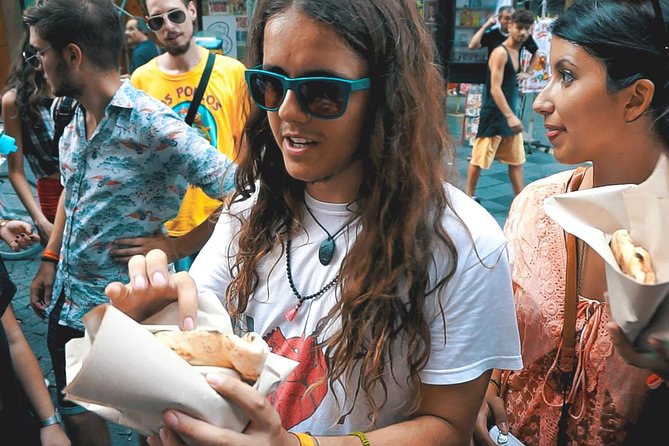 Naples street food walking tour - Stop 1: Mercato della Pignasecca and its loud, musical market energy
