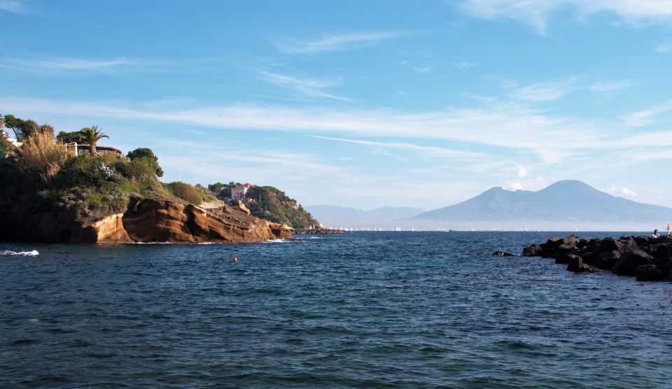 Naples: Sunset Cruise by boat with Aperol Spritz and Snacks - Trentaremi Bay: When Romans, Rocks, and Sea Collide