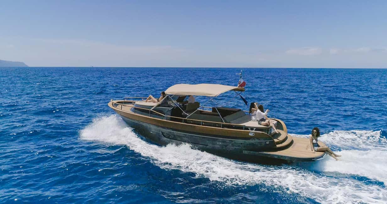 Naples: Sunset Cruise by boat with Aperol Spritz and Snacks - Getting On the Boat: Mergellina Meeting Point and What to Bring