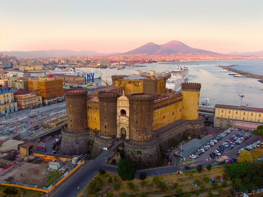 Naples: walk to Naples with local guide - Piazza del Plebiscito and San Carlo Theater: where the city turns cinematic