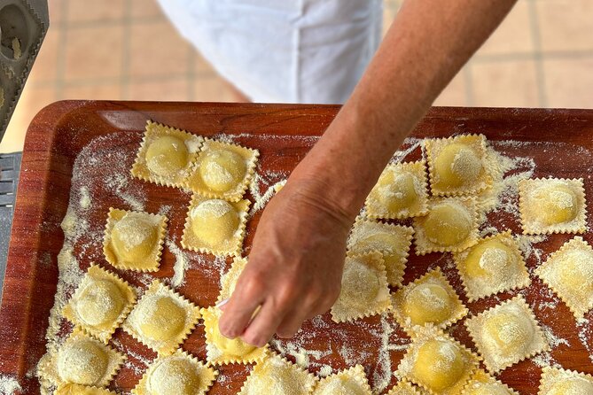 Pasta Cooking class in Pompeii - The family-table part: wine, laughter, and small surprises