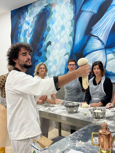 Pizza-Making Workshop by night with glass of wine - Naples at night, apron on: what the experience really feels like