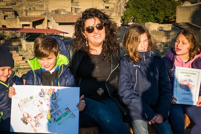 Pompeii & Herculaneum Family Adventure | Guide+Transport+Tickets - Exercise courtyard, baths, and the cult of the Emperor