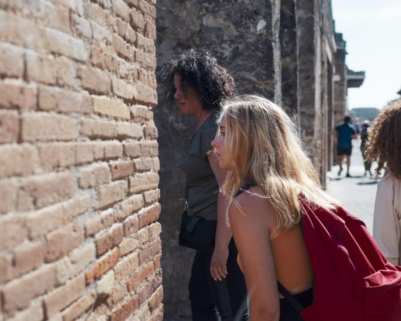 Pompeii & Herculaneum: Skip-the-line & Digital Guide App - Getting your tickets in Pompeii: WhatsApp plus an office pickup