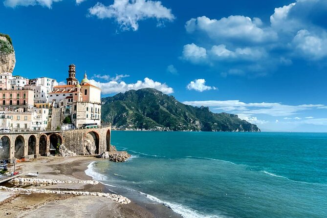 Private Amalfi Coast tour by Vintage Fiat 600 from Naples - The coastal curve story: sirens, sea color, and photo pauses