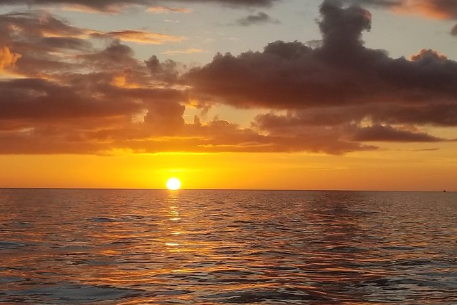 PRIVATE Sunset & Sightseeing Boat Trip of Naples Bay and the Gulf - Onboard Comfort and Included Extras: Music, Snacks, and Rain Gear
