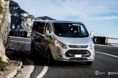 Shared shuttle service from Naples Central Station to Praiano - On-the-Road Comfort: what the driver quality changes for you