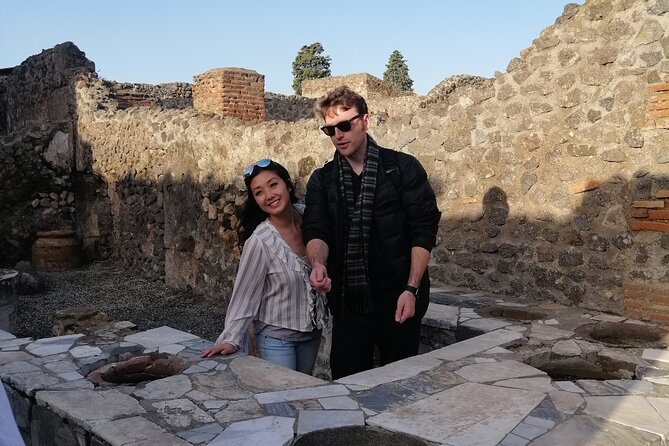 The charm of Pompeii and Herculaneum.Private Tour with Official Guide - Pompeii to Herculaneum by train: fewer logistics headaches